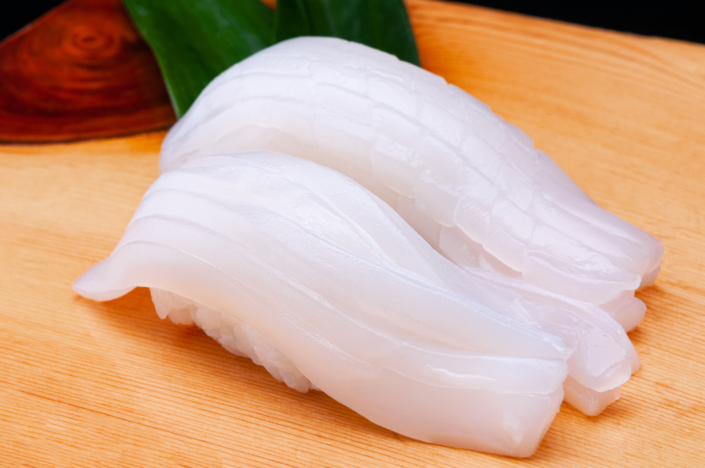 Japanese,Squid,Ika,Sushi,With,Wooden,Plate.